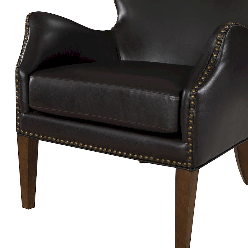 Fauteuil d'appoint à accoudoirs inclinés et hauts pieds en similicuir avec clous décoratifs