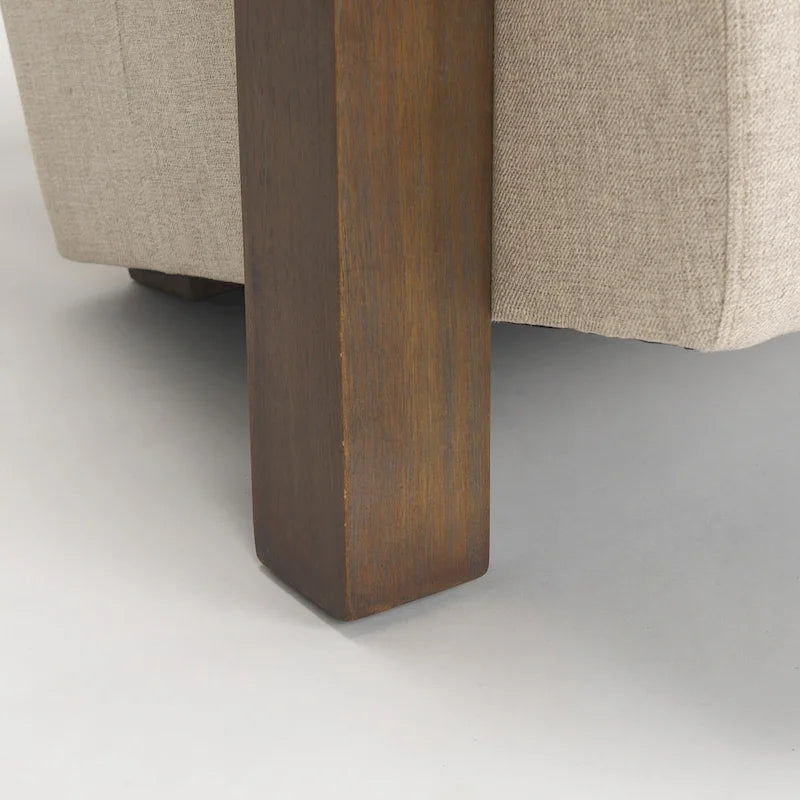 Fauteuil d'appoint rembourré en tissu beige avec structure en bois massif pour salon