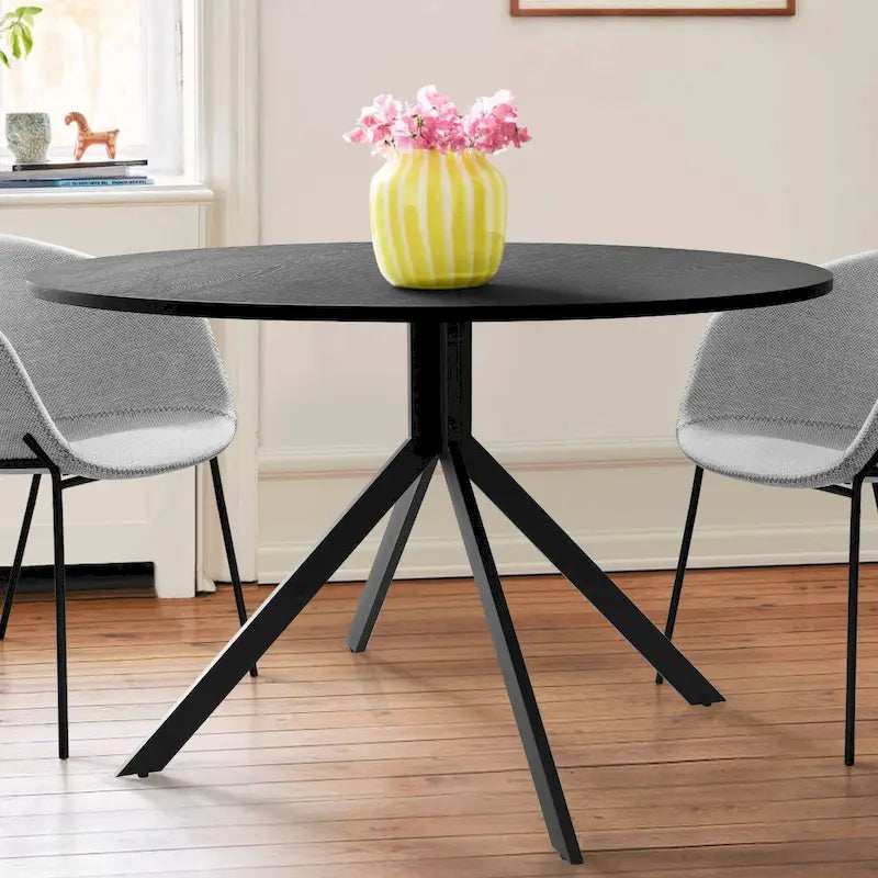 Table à manger ronde moderne noire avec plateau en bois de chêne et base en métal