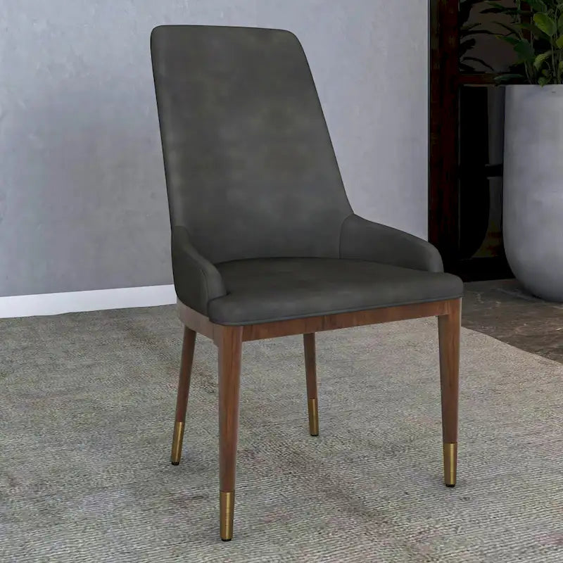 Chaise de salle à manger moderne rembourrée en cuir avec dossier haut en mousse